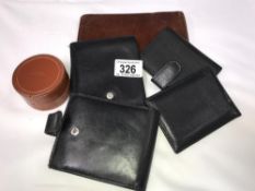 A quantity of leather wallets etc.