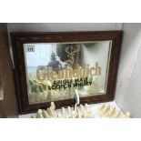 A Glen Fiddich framed advertising mirror