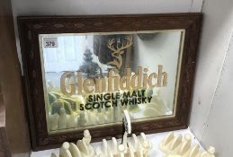 A Glen Fiddich framed advertising mirror