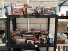 2 shelves of boxed Diecast fire engines
