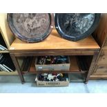 An oak coffee table on bun feet