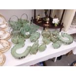 A lot of green glass in metal baskets