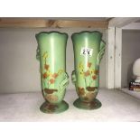 A pair of art pottery vases,