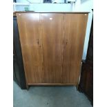 A vintage AC handcraft quality triple wardrobe