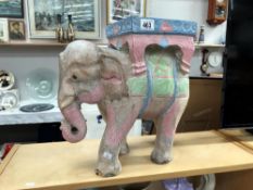 A large painted wooden elephant stool / plant stand