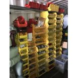 A large quantity of stackable storage and contents including electrical parts, fixings etc.