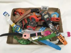 A box of childrens wristwatches