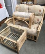 A bamboo conservatory 2 seater settee,