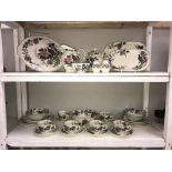 2 shelves of Myott Meakin Dynasty collection exotic garden dinnerware