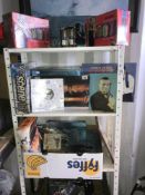 3 shelves of James Bond items including boxed set, books, trading cards etc.