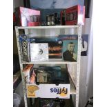 3 shelves of James Bond items including boxed set, books, trading cards etc.