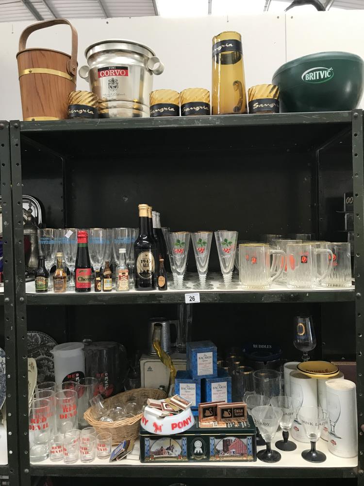 3 shelves of breweriana advertising items