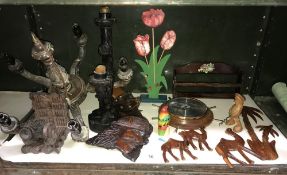 A quantity of wooden items including wall hangings, chandelier etc.