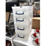 A set of plastic stacking storage drawers