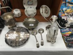 A mixed lot of silver plate including candelabra, ice bucket etc.