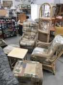 A pair of cane conservatory chairs, 2 stools,