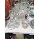 A glass punch bowl with 11 cups, 6 other punch cups,