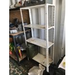 A 4 shelf metal storage rack