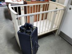 A vintage pedigree baby cot and a travel cot