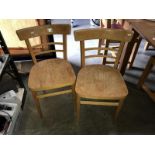 A pair of kitchen chairs