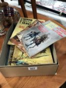 A box of 1960's "The West" magazines and cinema/picture show annuals