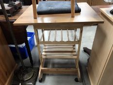 A modern kitchen trolley incorporating wine rack