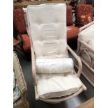 A white swivel chair