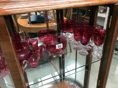 A mixed lot of cranberry glass