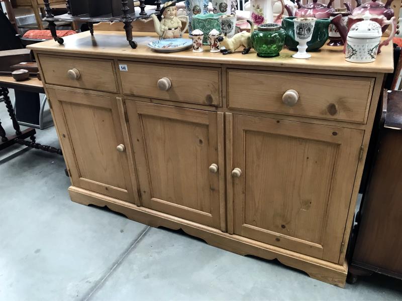 A pine 3 drawer 3 door dresser base