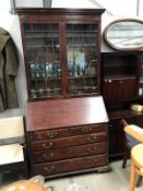 A Victorian mahogany astragal glazed bureau/bookcase