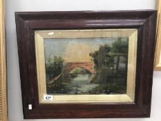 A framed and glazed oil painting of bridge over water initialled J.H.R.