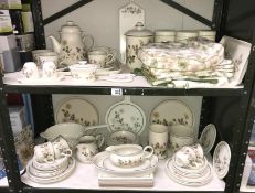 2 shelves of Autumn Leaves table ware