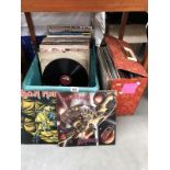 A box and case of LP and 45rpm records including Now That's What I Call Music, Iron Maiden, AC/DC,