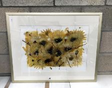 A framed and glazed print of sunflowers