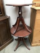 A pair of mahogany circular tables