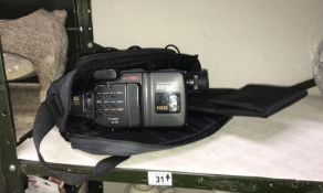 A Canon 8mm video camcorder with case