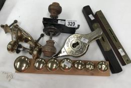 2 brass faced levels old brass door knobs,
