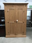 A pine 2 door wardrobe
