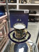 A boxed silent night tea cup and saucer