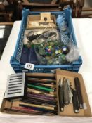 A mixed lot including marbles, pens, coins, costume jewellery, pocket knives etc.