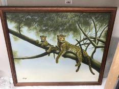 An oil on canvas of leopard with cub in tree signed George