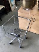 A Chrome & Perspex office chair