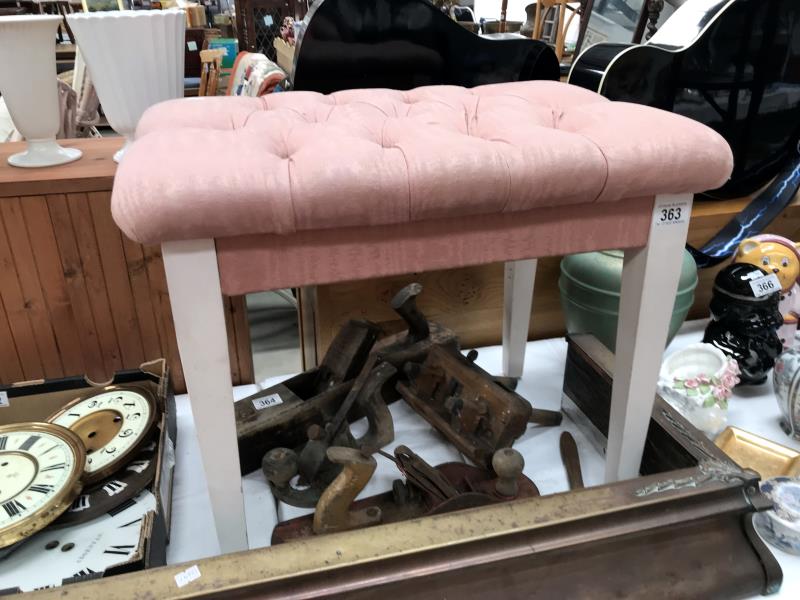 A dressing table stool