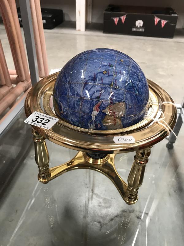 A gemset table globe