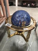 A gemset table globe
