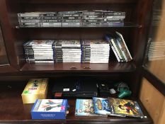 A Play Station 2 and a quantity of games