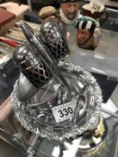 A silver plate cruet set and a silver plate tray