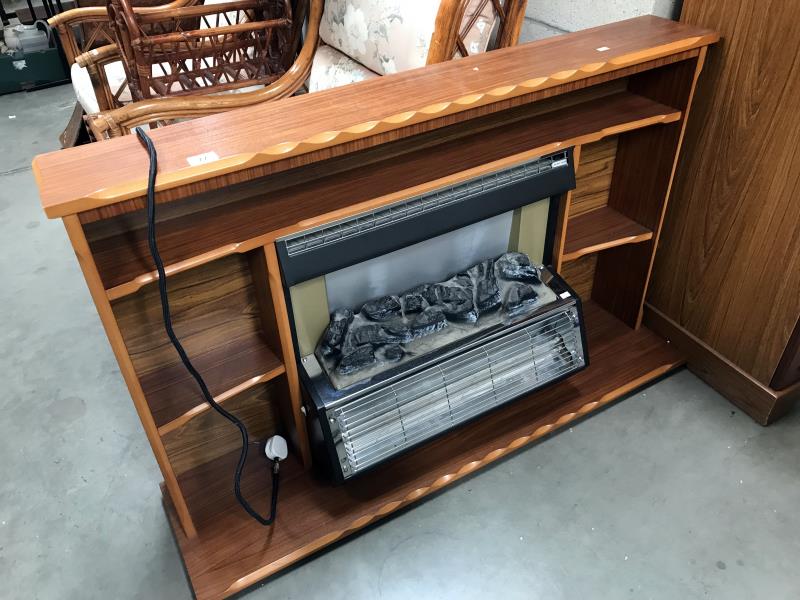 An electric fire plus surround