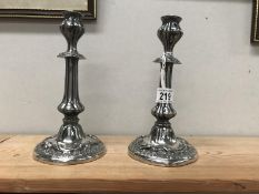 A pair of silver plate candlesticks