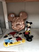 A quantity of Disney items including salt and pepper pots, a Mickey jelly mould,